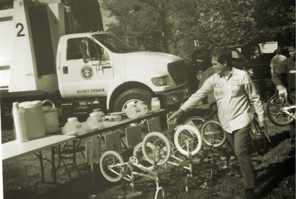 Public Works employees set out bicycles they repaired and painted for a free raffle